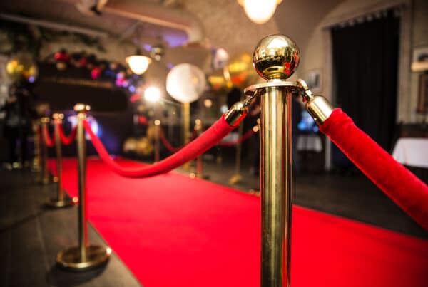 Red carpet with gold stanchions.